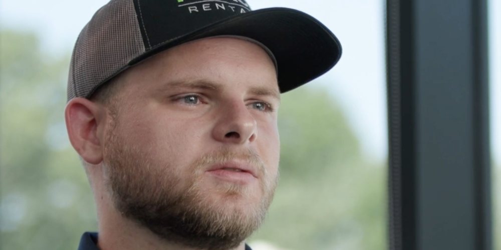 Close-up of a man in a ball cap speaking during an on-camera interview, video production by Mighty 8th Media